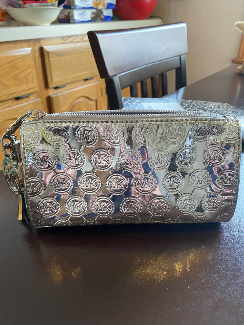 Michael Kors Metallic Silver MK Embossed Cosmetic Case